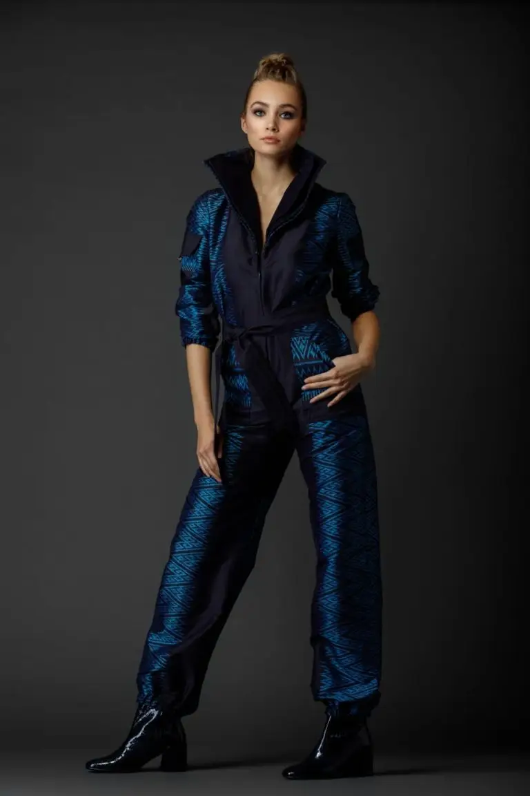 Full view of blue Thai silk couture jumpsuit with pleated harmonica-style collar and refined tailoring, by Saskia ter Welle
