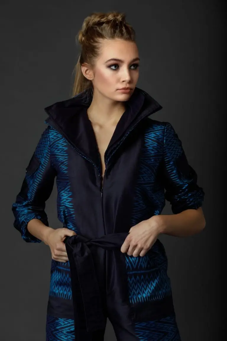 Front view of blue Thai silk couture jumpsuit showing pleated harmonica-style collar and tailored bodice, by Saskia ter Welle