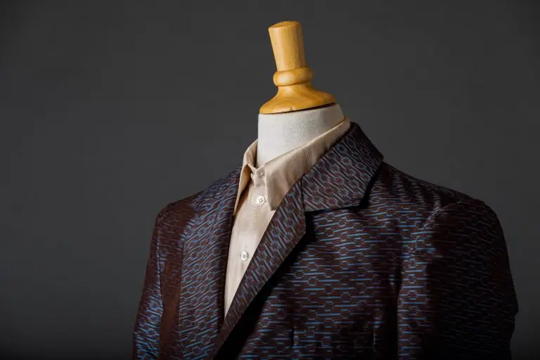 Couture suit in Thai silk with woven graphic pattern, styled with matching shirt, by Saskia ter Welle
