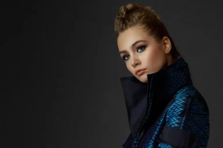 Close-up of blue Thai silk couture jumpsuit with pleated harmonica-style collar detail, by Saskia ter Welle