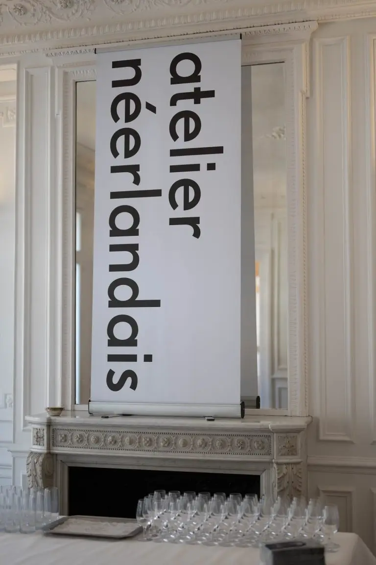 Banner of Atelier Néerlandais at the Pop Up exhibition in Paris, featuring 31 Dutch artists including couture by Saskia ter Welle