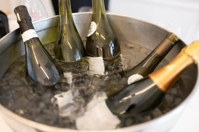 Wine bottles in an ice cooler during the opening of the Pop Up exhibition at Atelier Néerlandais in Paris