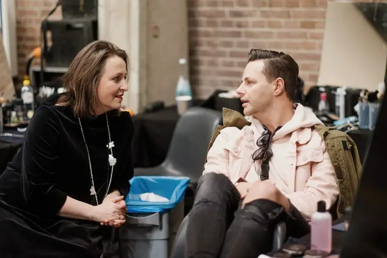Saskia ter Welle with stylist Fred van Leer backstage during her couture show “Come Fly with Me” at Amsterdam Fashion Week